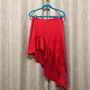 Red asymmetrical, poly/spandex blend
